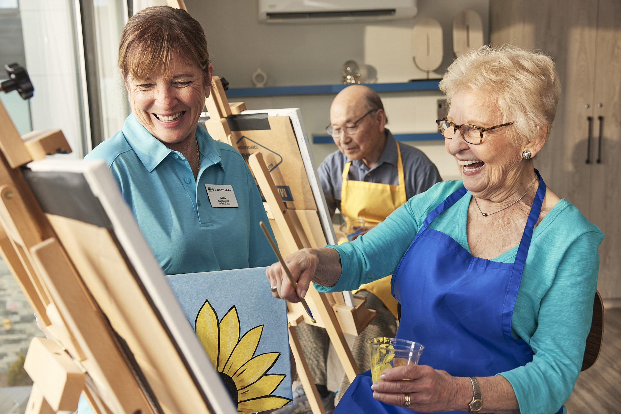 Residents engaging in a painting activity.