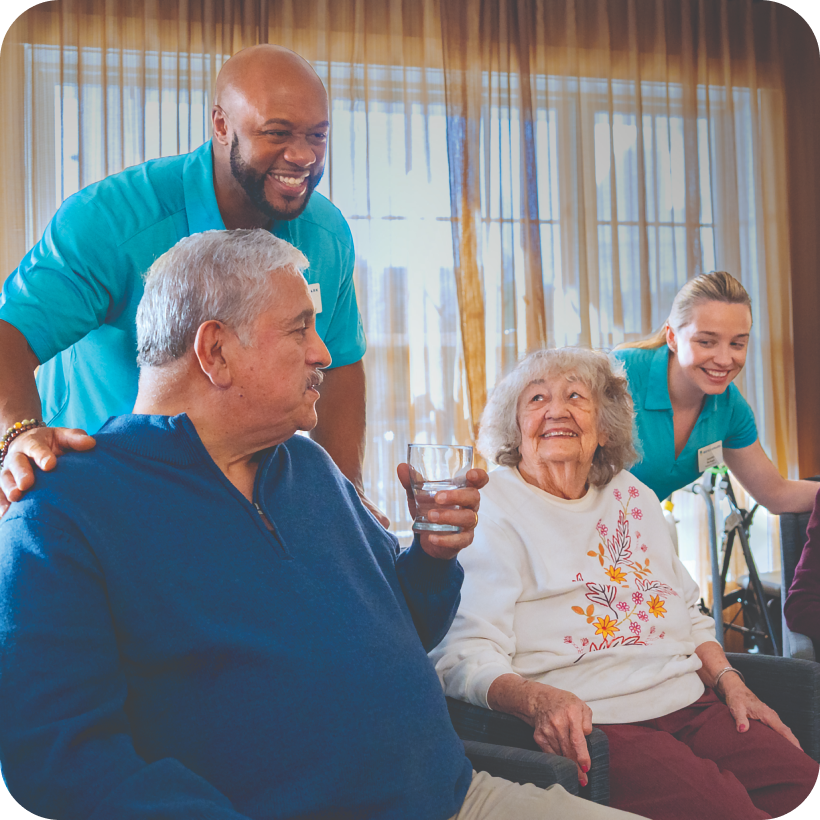 Care staff interacting with senior residents