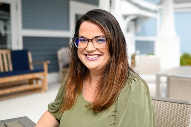 Woman smiling in a relaxed setting