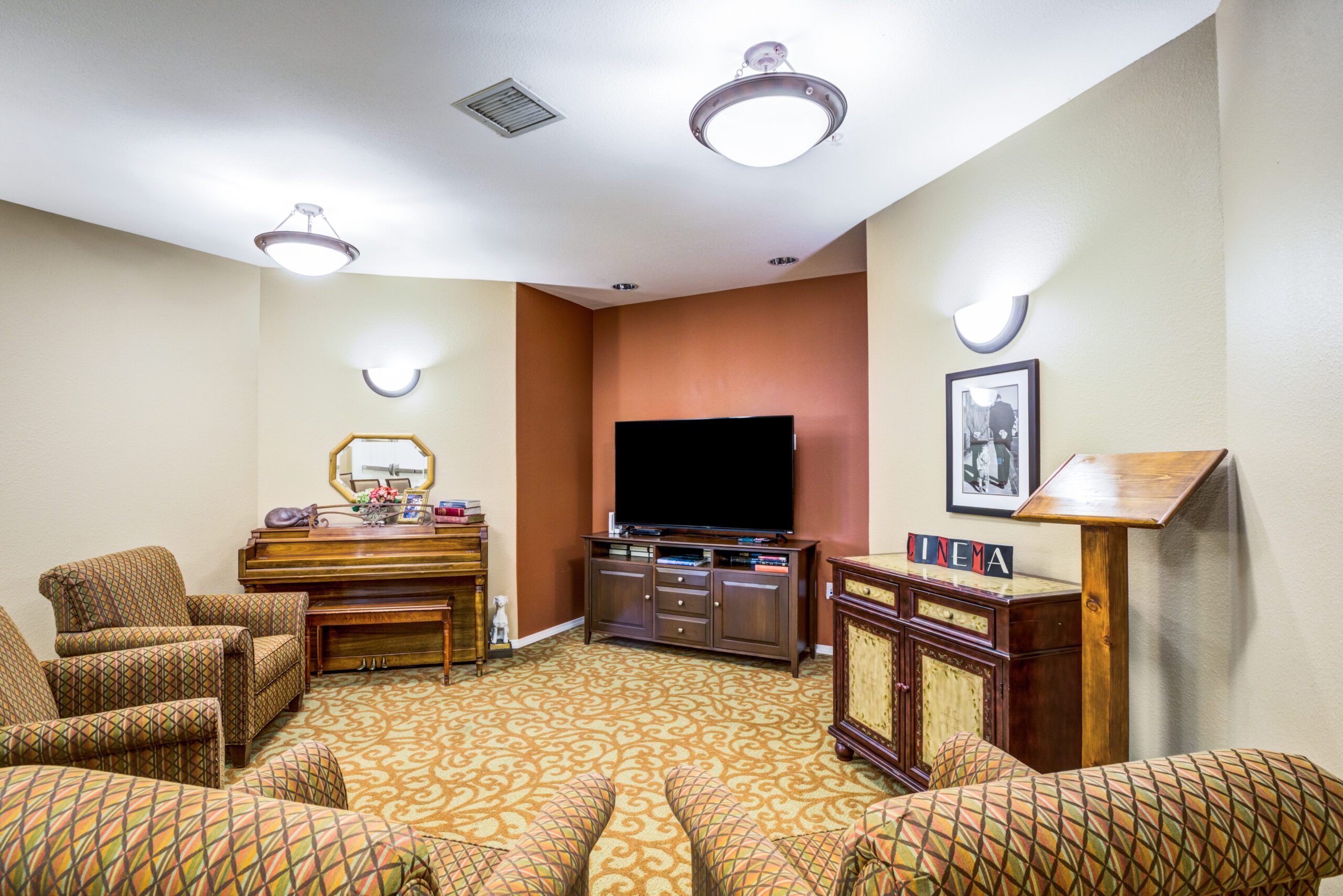 Common area with seating and a TV.