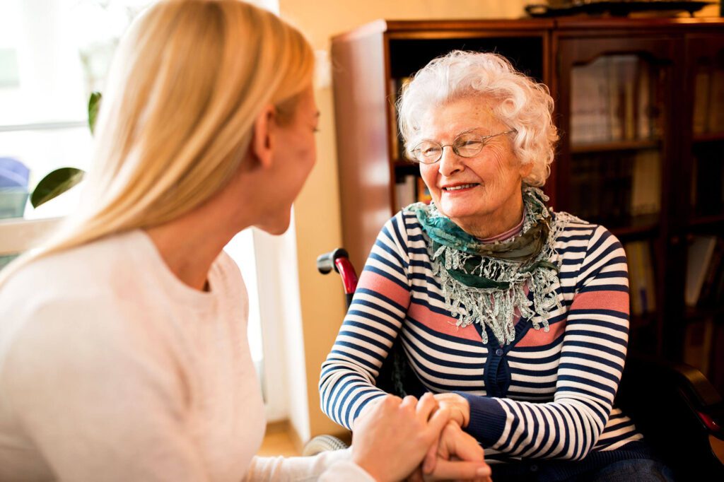 Senior resident engaging with a caregiver