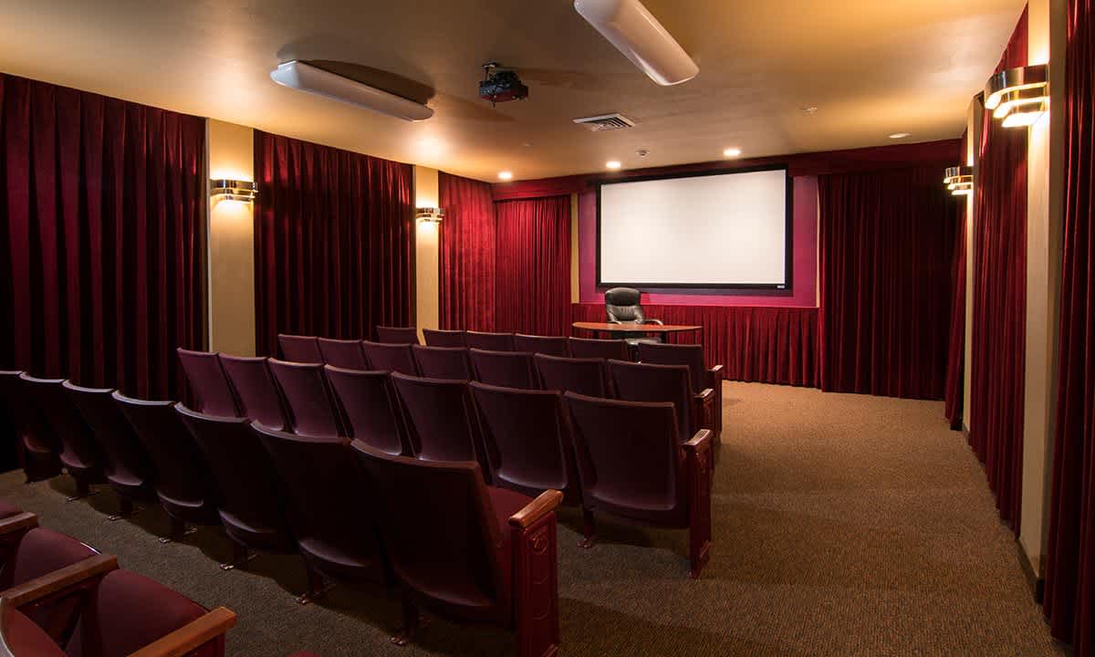 Interior of a small theater with seating