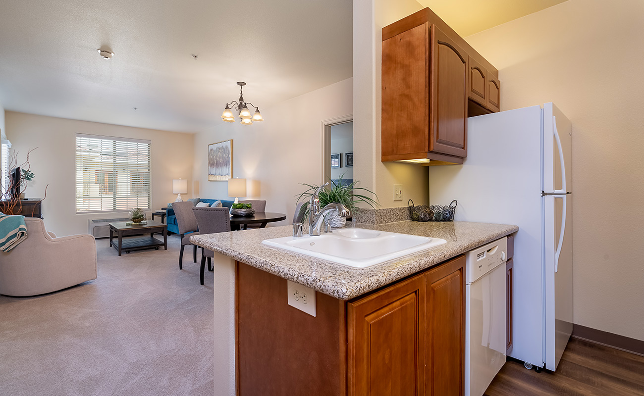 Cozy interior of a resident room with kitchen.