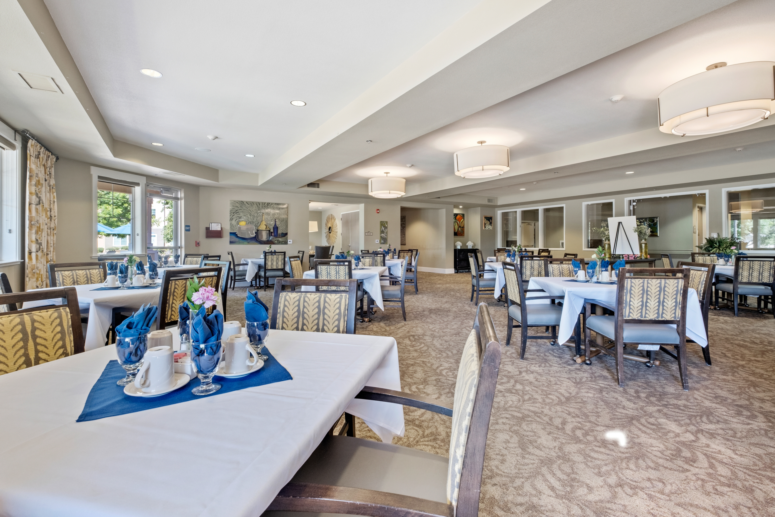 Well-arranged dining area with tables and decor