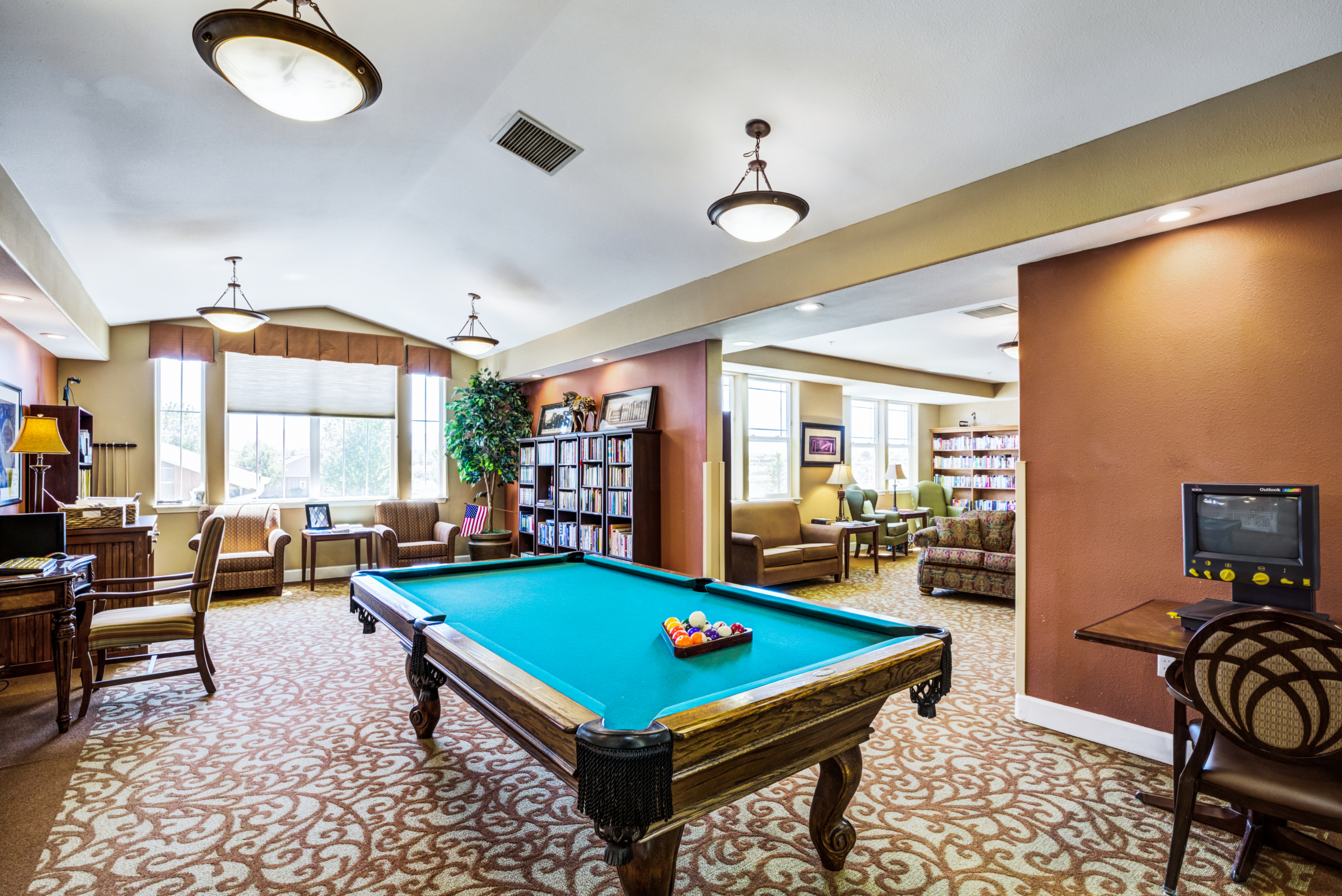 Interior lounge area with billiard table and seating
