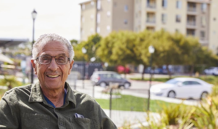 Smiling senior man in outdoor space