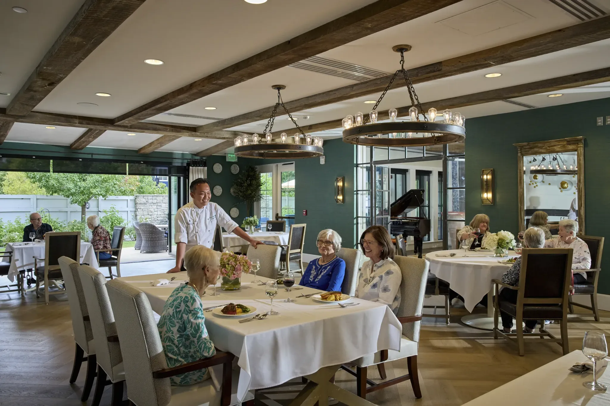 Residents enjoying a meal in the dining room