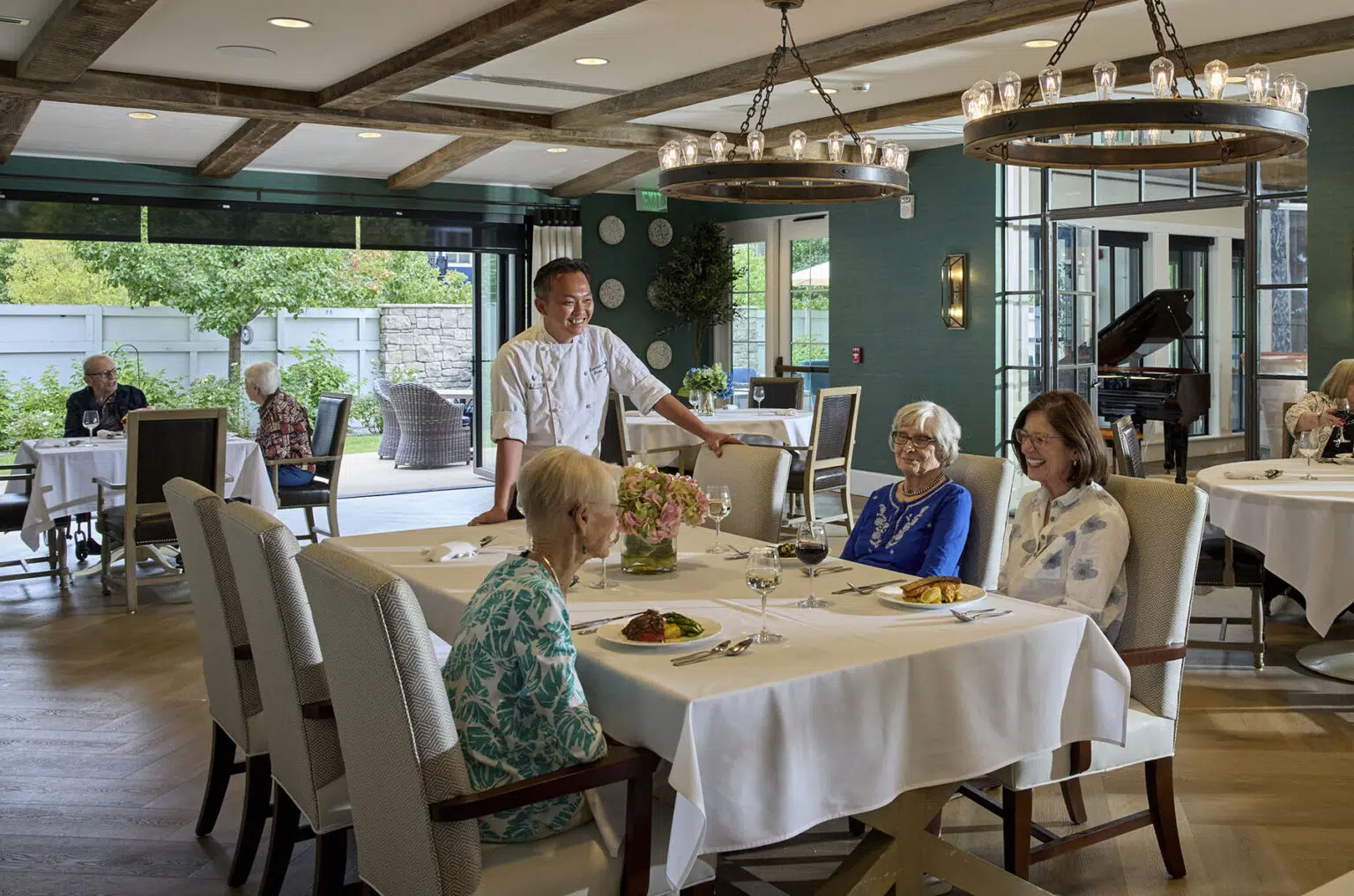 Residents enjoying a meal in the dining room