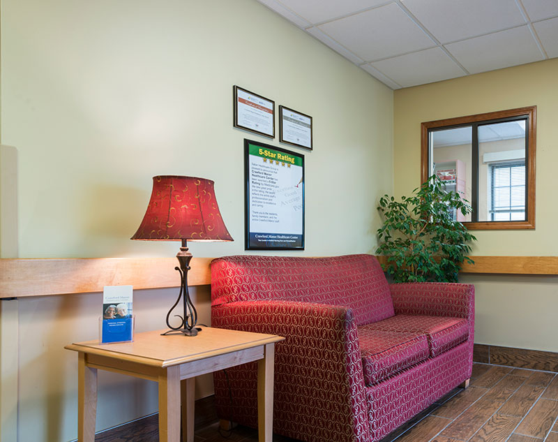 Common area with a sofa and lamp