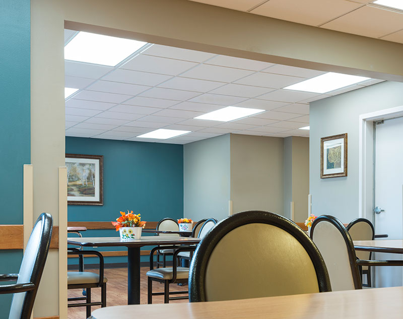 Interior dining area with tables and artwork