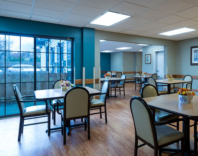 Dining area with tables and flowers