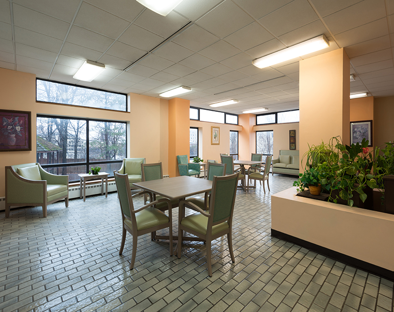 Common area with seating and plants.