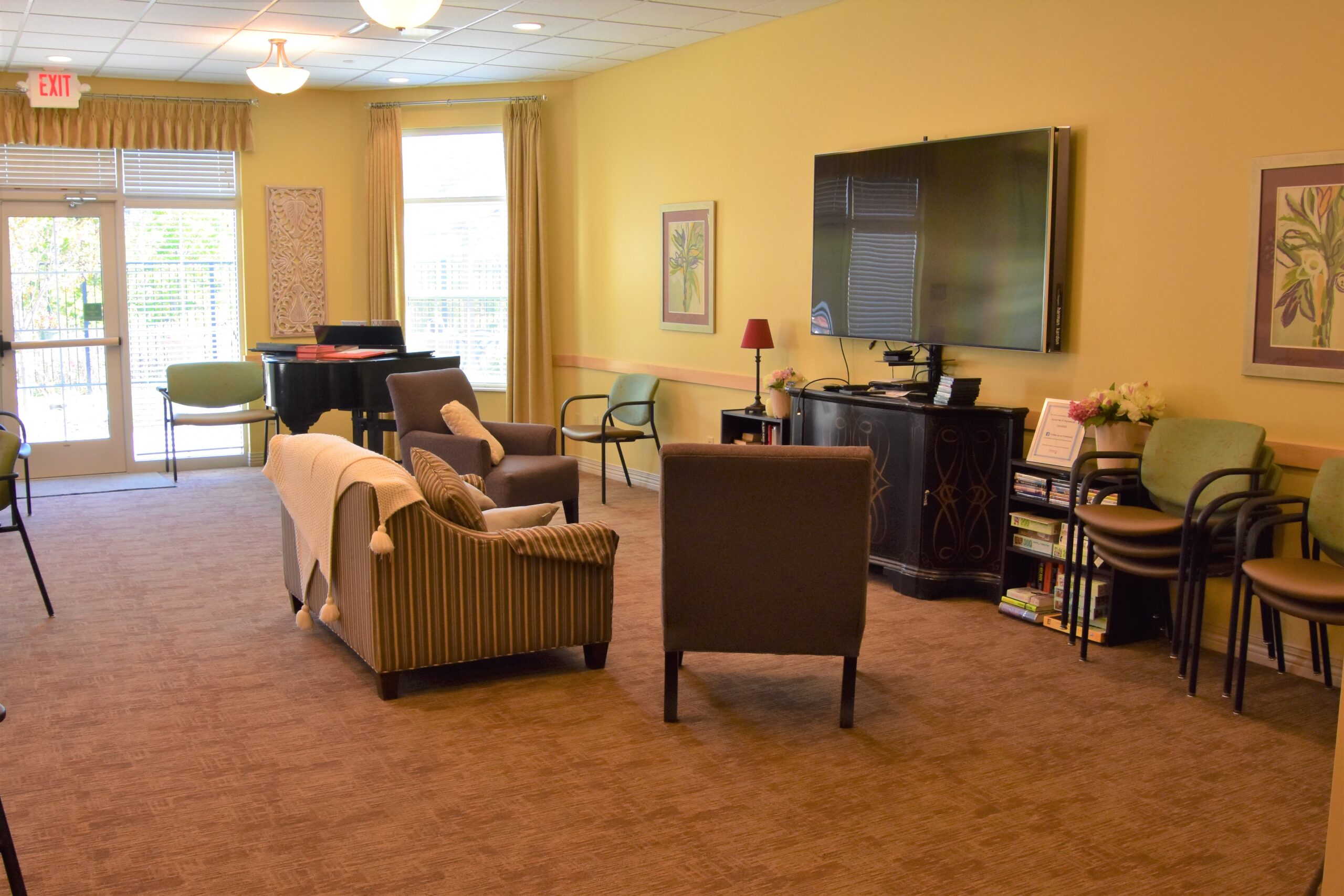 Cozy common area with seating and TV.