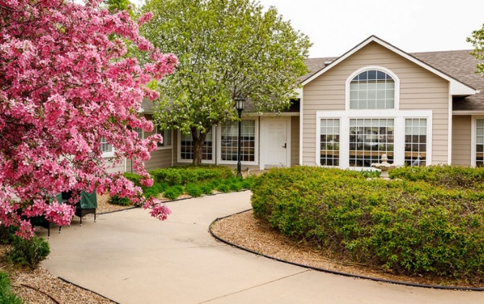 Building exterior with blooming flowers