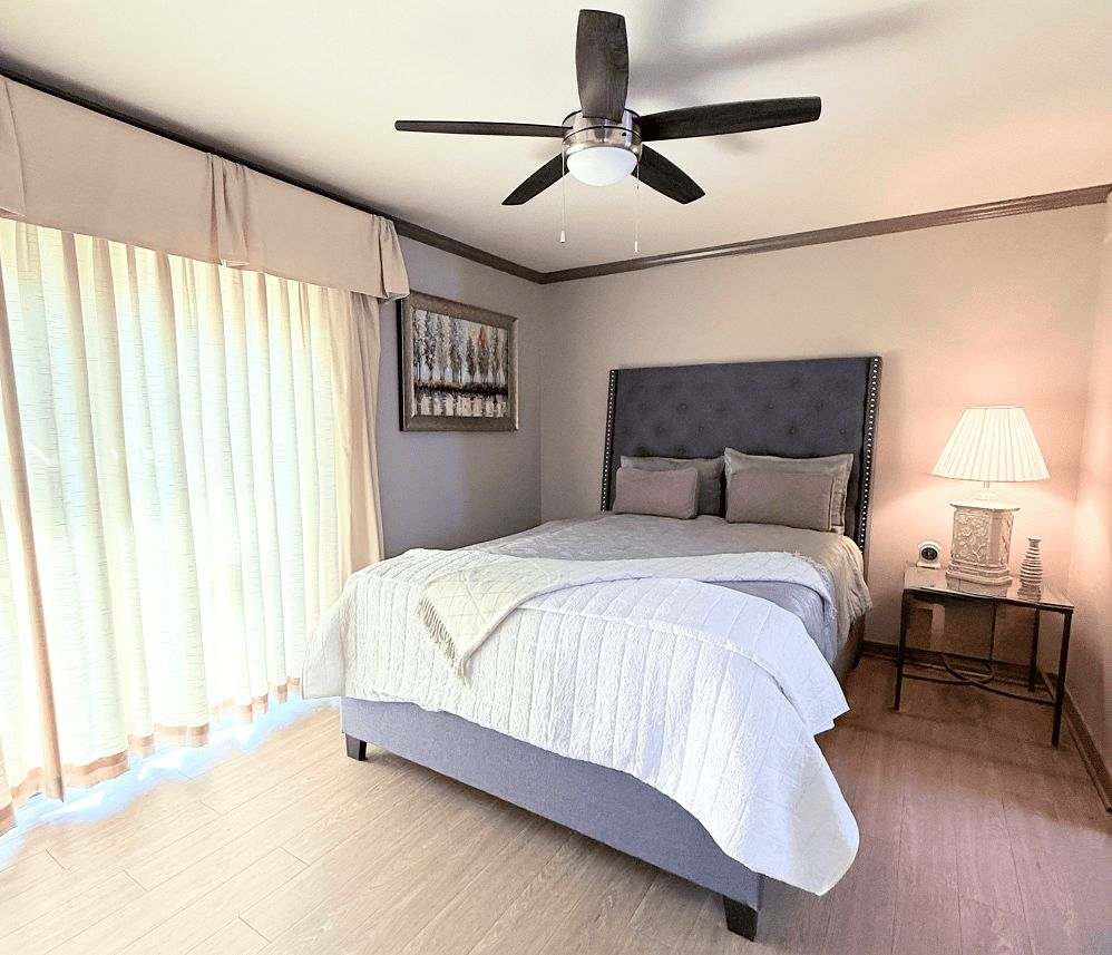 Cozy resident bedroom with natural light