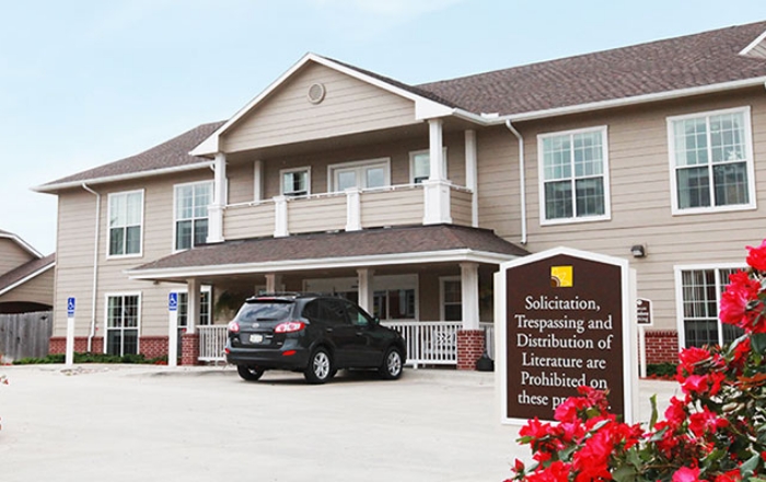 Exterior view of the facility with flowers