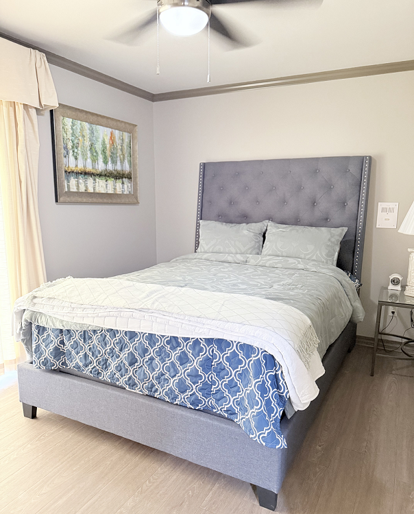 Cozy bedroom with a queen-size bed and decor