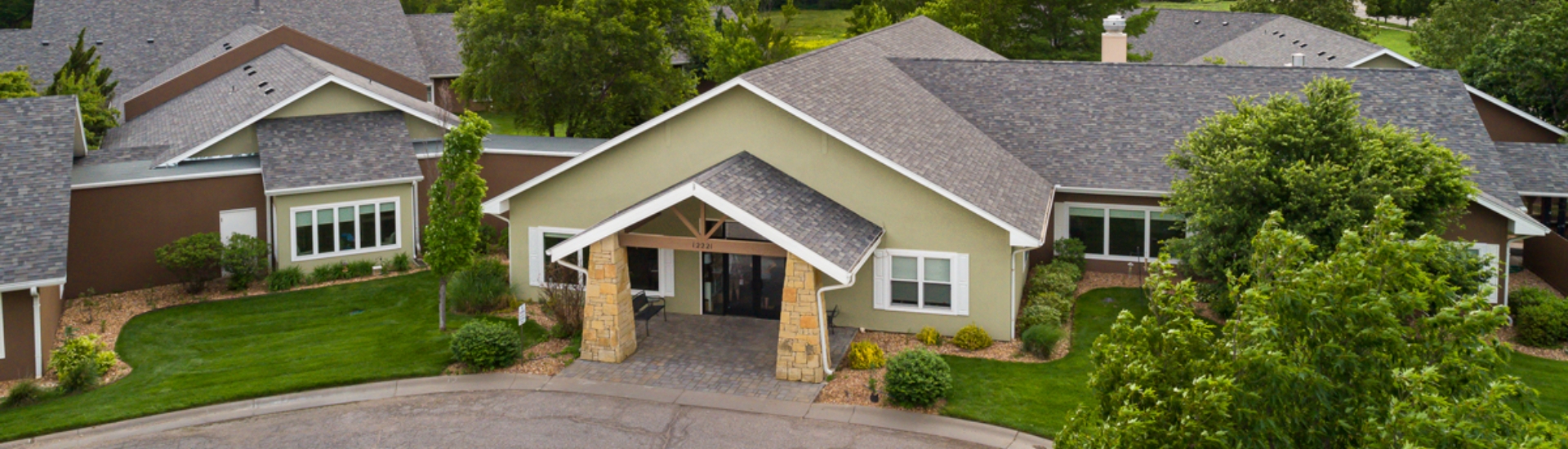 Aerial view of Homestead Estates building exterior.