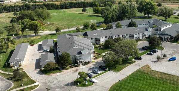 Aerial view of the facility and surrounding green space.