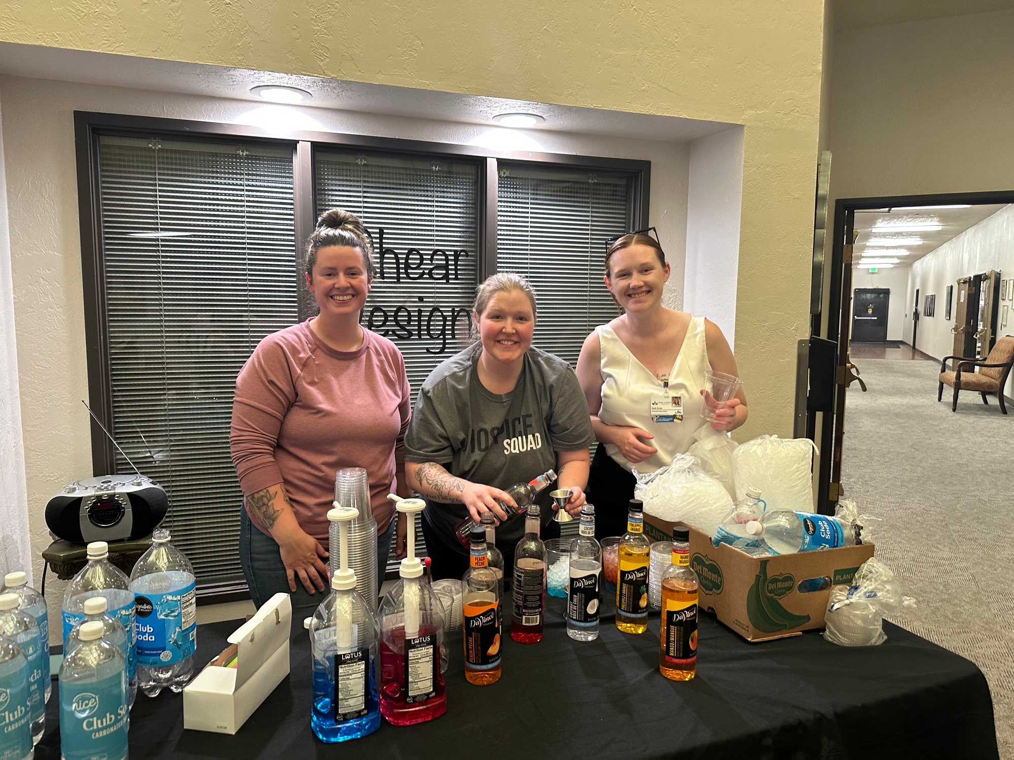 Staff preparing drinks at an event