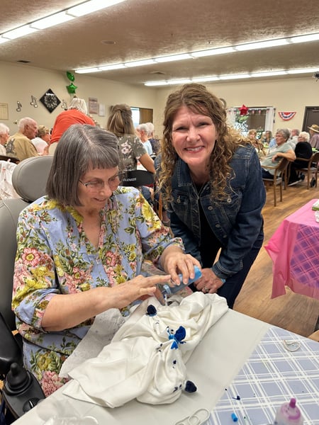 Residents participating in a crafting activity.