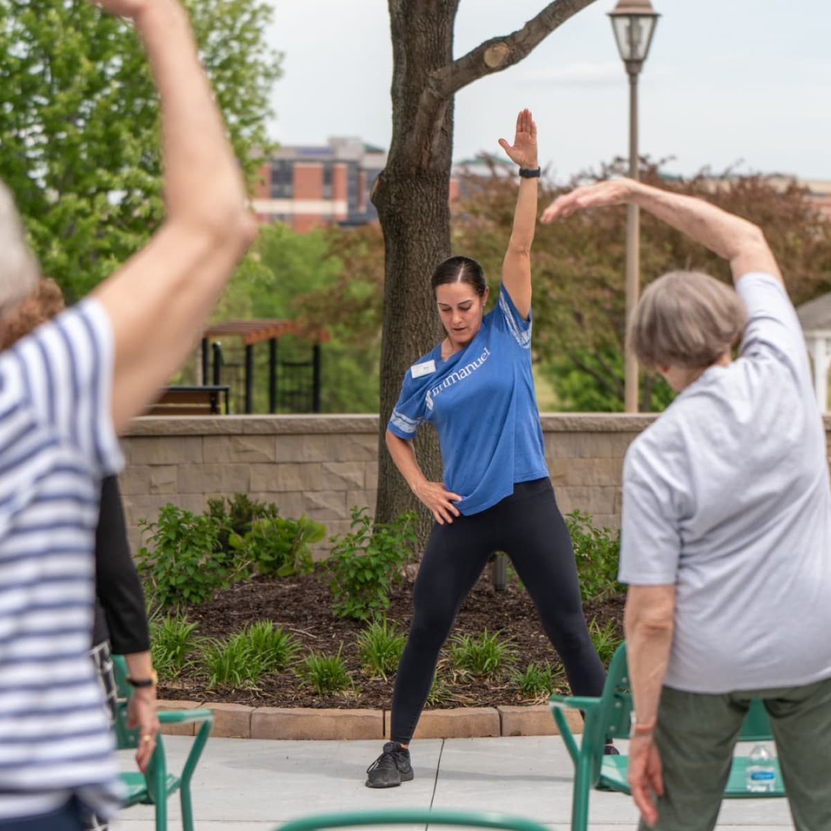 Residents participating in an outdoor exercise class.