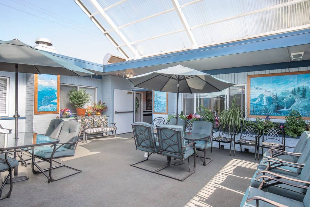Outdoor patio with seating and umbrellas
