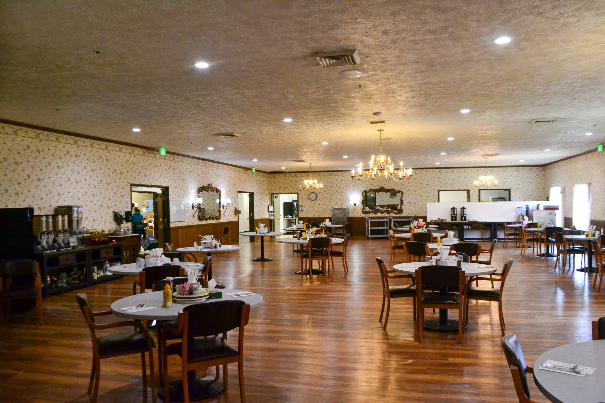 Dining area with tables and decorations.