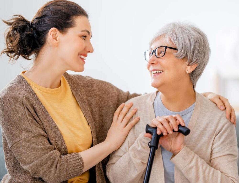 Caregiver interacting with an elderly resident