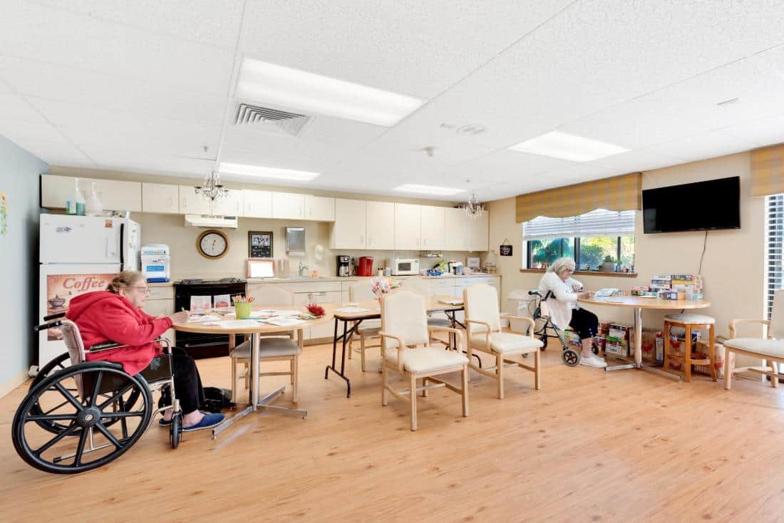 Residents engaging in a common area of the facility.