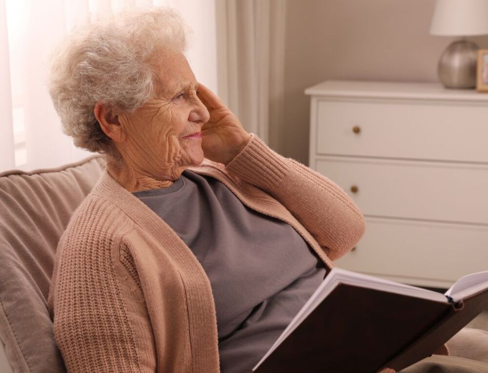 Senior woman reading in a cozy room