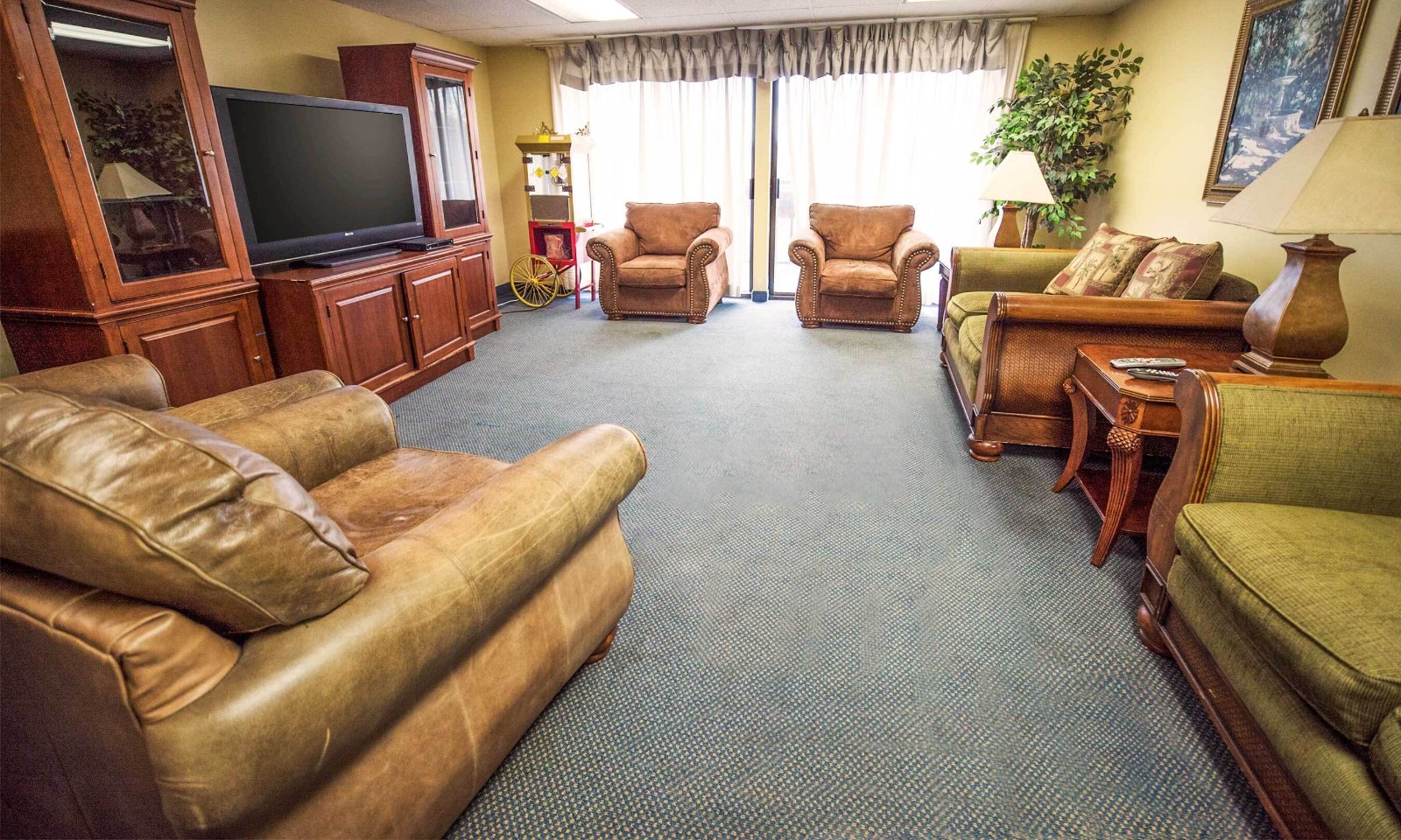 Cozy common area with seating and TV