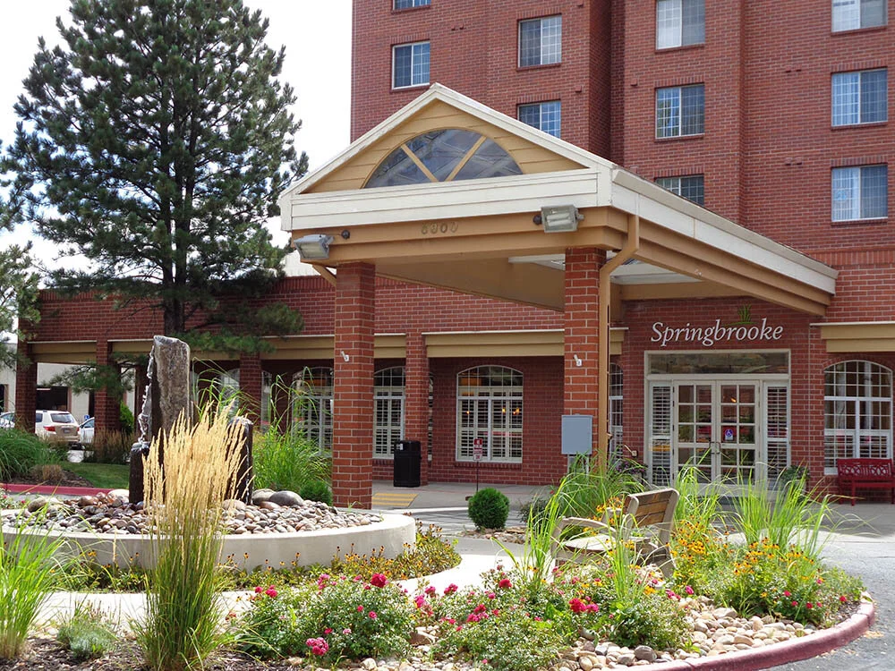 Exterior view of Springbrooke Retirement facility entrance.