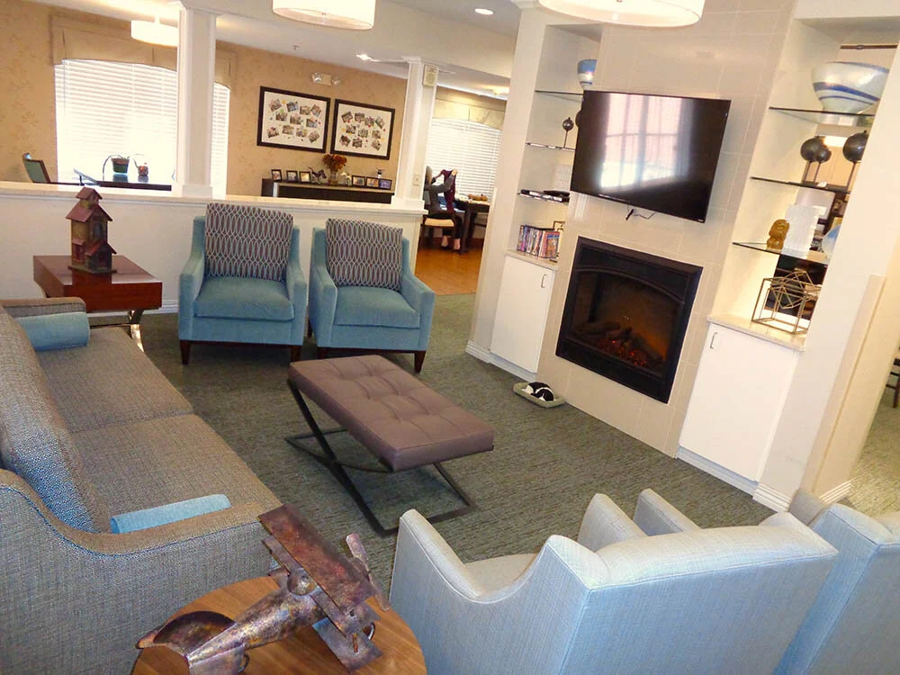Common area with seating and a fireplace