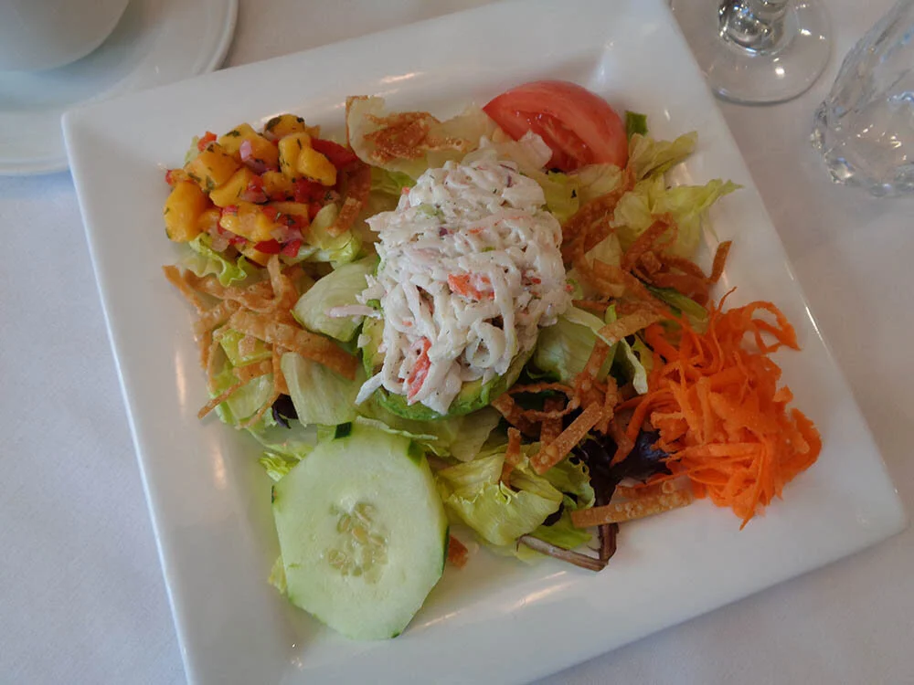 Plate of salad with various toppings