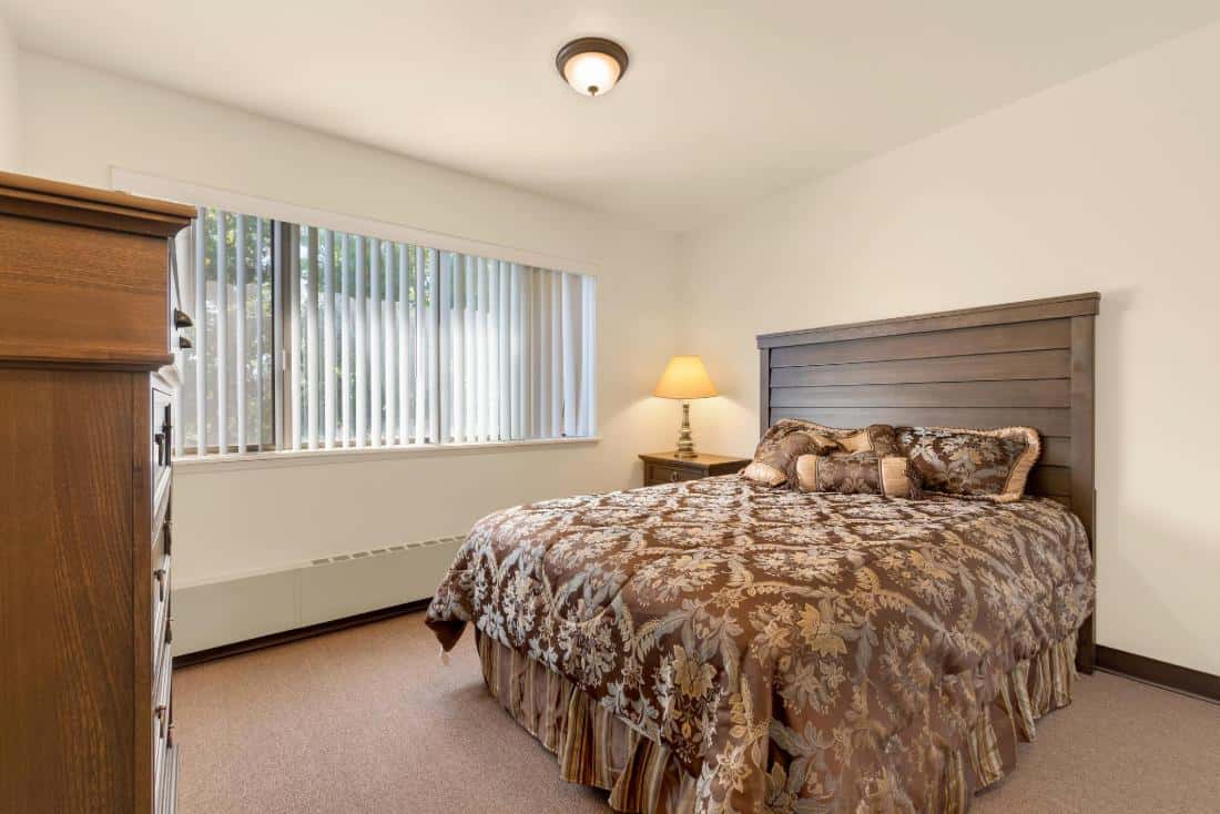 Comfortable senior living bedroom with patterned bedding