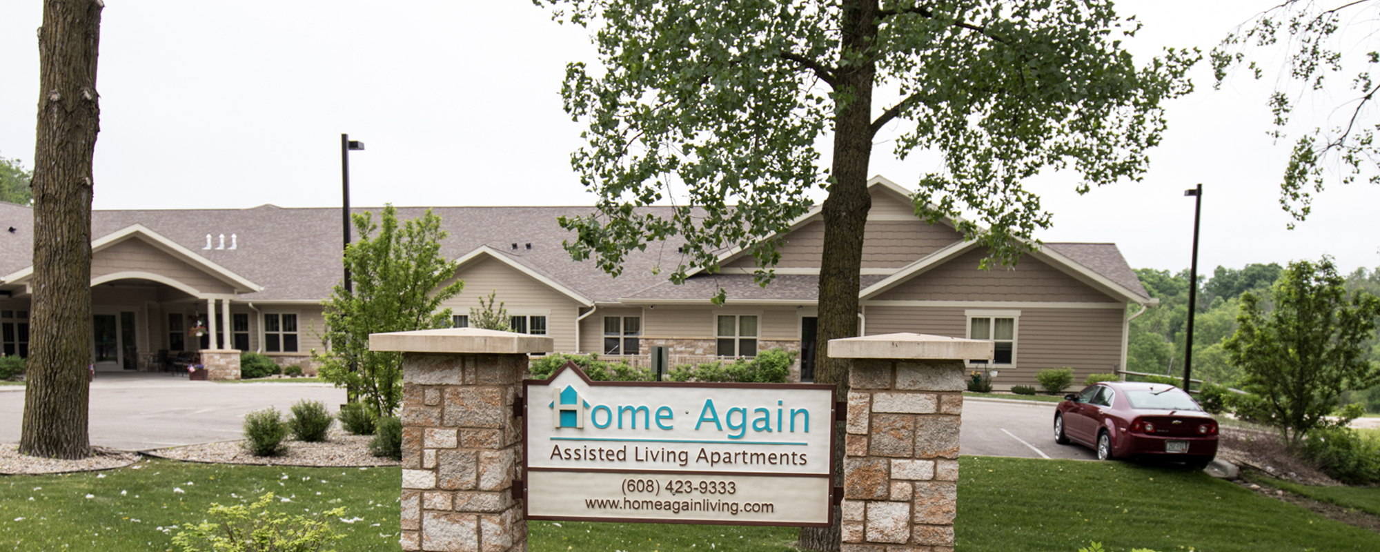 Exterior view of Home Again Assisted Living Apartments entry