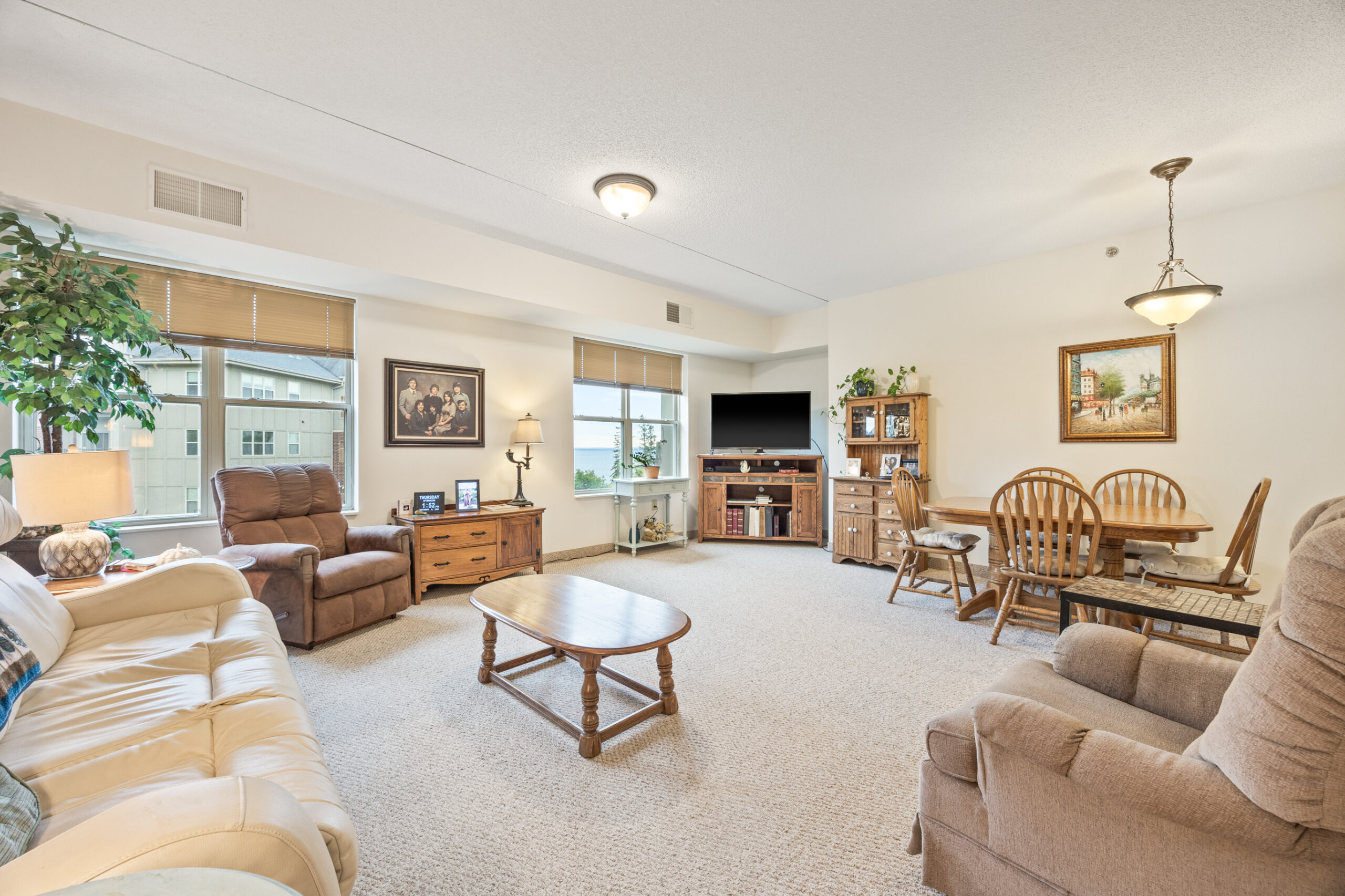 Bright common area with seating and decor
