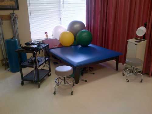Rehabilitation therapy room with exercise equipment
