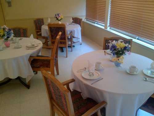 Dining area with tables set for meals