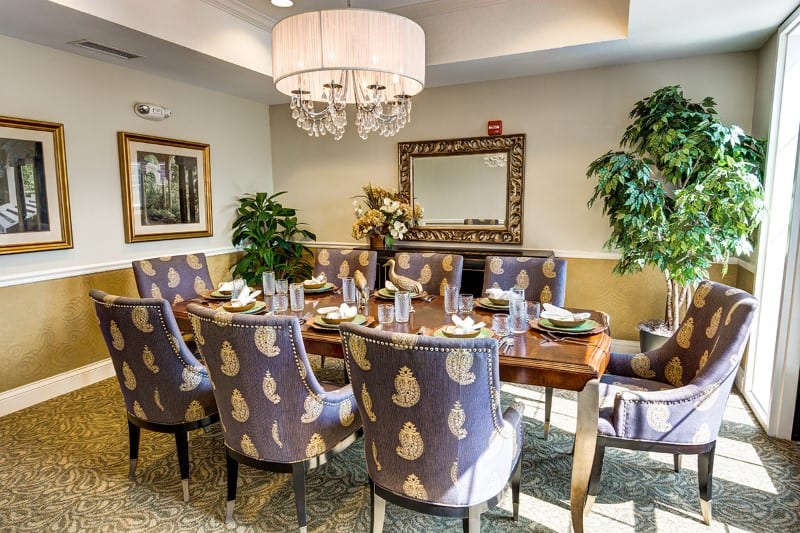 Elegant dining room setup with floral decor