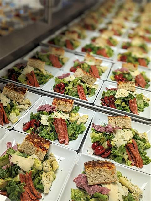 Close-up of vibrantly plated meals in a dining area