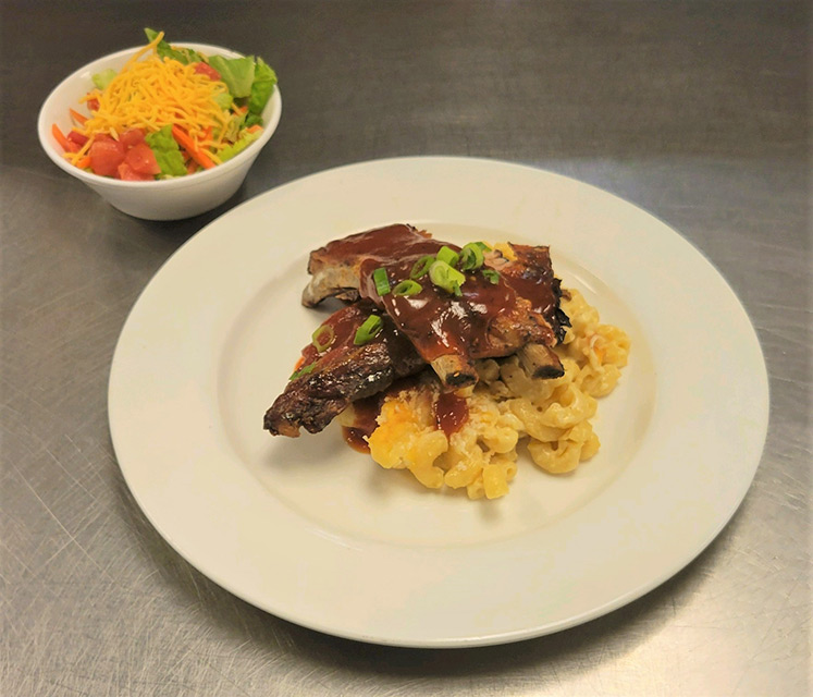 Plate of food with salad and side dishes