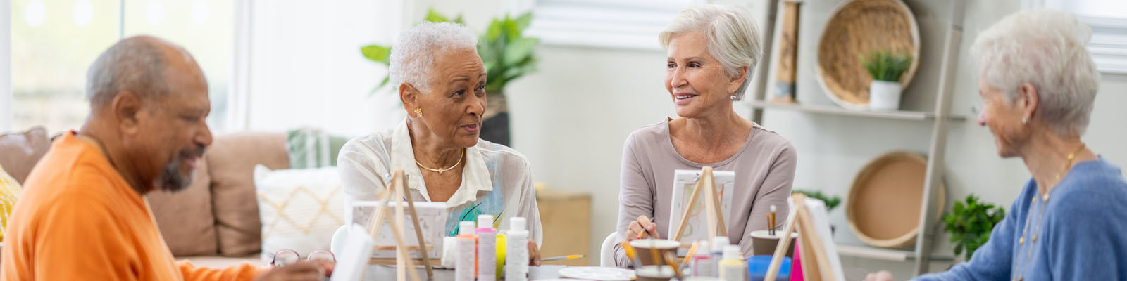 Residents engaged in an art activity together