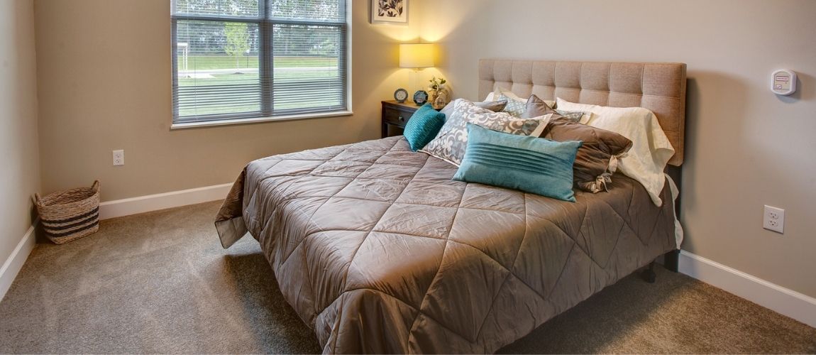 Cozy interior view of a decorated private bedroom