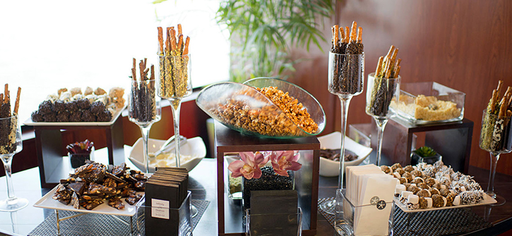 A display of various desserts and snacks on a table