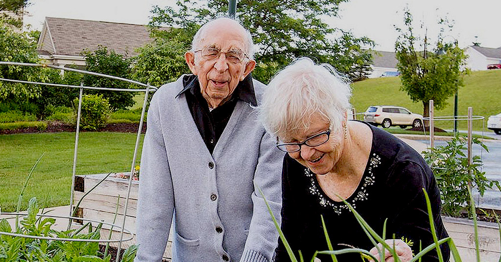 Residents enjoying gardening in an outdoor area