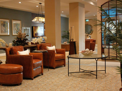 Interior view of a cozy common area with seating