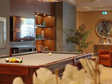 Interior view of a common area with billiards table