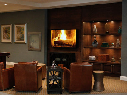 Cozy common area with a fireplace and seating